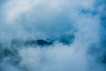 Obraz premium Misty landscape encounter mountain range nature photography cloudy atmosphere aerial view serene vibes