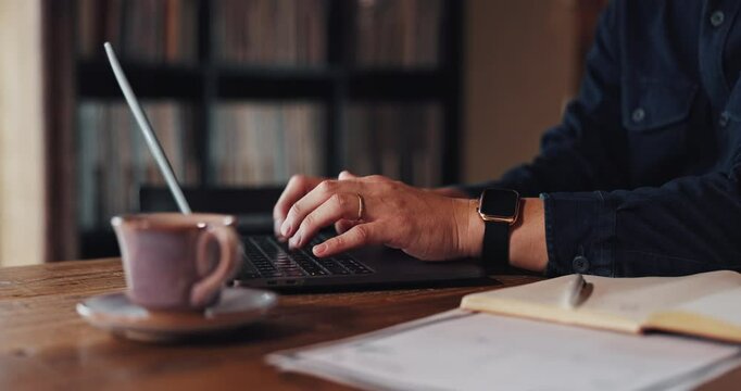 Hands, typing and man in home office with laptop, research notes and business plan for freelance project. Remote work, connectivity and Japanese person at desk writing email, report or online review.