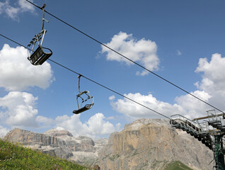 seats of the chairlift that takes people to the top of the mountain exactly 5
