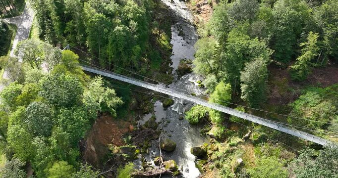 Aerial drone video of the Irrel Waterfalls and the new suspension bridge, highlighting the natural beauty .