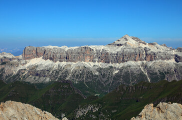 sass pordoi and piz boe mountains of the european alps seen from marmolada glacier in summer