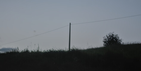 electricity pole in the field