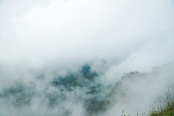 Fototapeta premium Misty mountain landscape nature scene cloudy environment serene viewpoint tranquility and mystery in nature