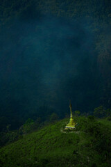 Serene buddhist stupa overlooking lush green hills myanmar landscape photography misty environment elevated perspective peaceful concept