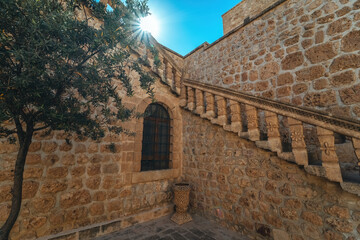 Obraz premium Mor Gabriel Syriac Monastery in the Midyat district of Mardin province, Turkey. Photograph of the dirt stairs leading up to the monastery garden.