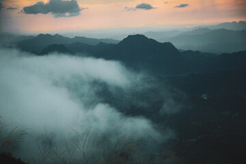 Breathtaking sunrise over misty mountains natural landscape outdoor photography serene environment...