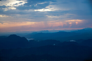 Obraz premium Breathtaking sunrise over mountain range nature landscape photography serene environment wide angle tranquility and beauty