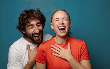 Obraz premium laughing out loud at some hilarious joke, feeling happy and cheerful, having fun