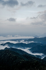 Obraz premium Breathtaking mountain view overlooking misty valleys nature photography serene environment aerial perspective tranquility