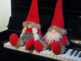 Elves - stuffed gnomes based on Santa Claus. Santa Claus's helpers of red and green color to...