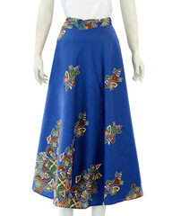 Women's blue wrapped batik skirt with ethnic motifs looks beautiful, simulated worn on a mannequin.