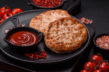 Grilled chicken burger cutlet with salt, spices and herbs