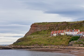 view of the cliffs and houses in Whitby - North Yorkshire - united kingdom