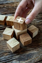 Health insurance concept hand arranging wood cube stacking with icon healthcare medical on wood background copy space financial concept.