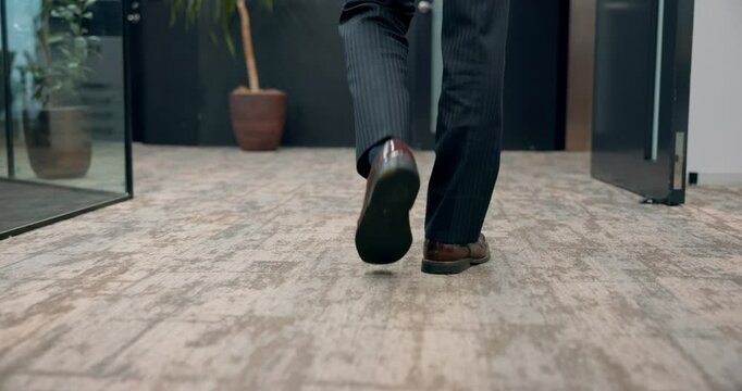 Businessman, legs or walking with shoes at office for movement, motion or commute in corridor. Closeup, man or feet of employee strolling on floor at workplace for career, job or business opportunity
