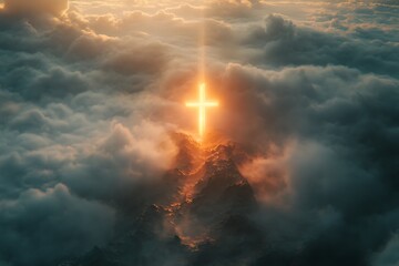 Obraz premium A glowing cross emerging from a sea of clouds with light rays beaming down
