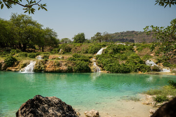 Wadi Darbat, located in the Dhofar region of Oman, is a lush, scenic valley known for its stunning waterfalls, crystal-clear lakes, and vibrant greenery.