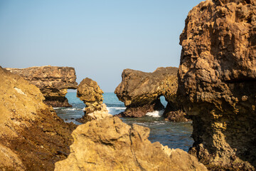 Fazayah Beach, located in Oman, is a hidden gem with its crystal-clear waters, pristine white sands, and dramatic rocky cliffs. 