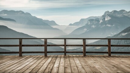 Vantage Point: Wooden deck offers a stunning panoramic view of a majestic mountain range, with rolling fog blanketing the valleys and peaks under a serene sky. 