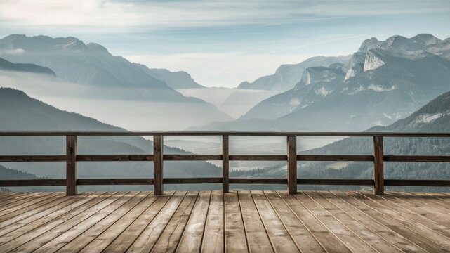 Vantage Point: Wooden deck offers a stunning panoramic view of a majestic mountain range, with rolling fog blanketing the valleys and peaks under a serene sky. 