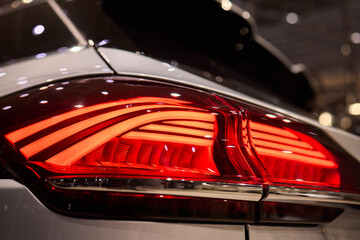 Naklejka premium Closeup of a cars automotive tail brake light