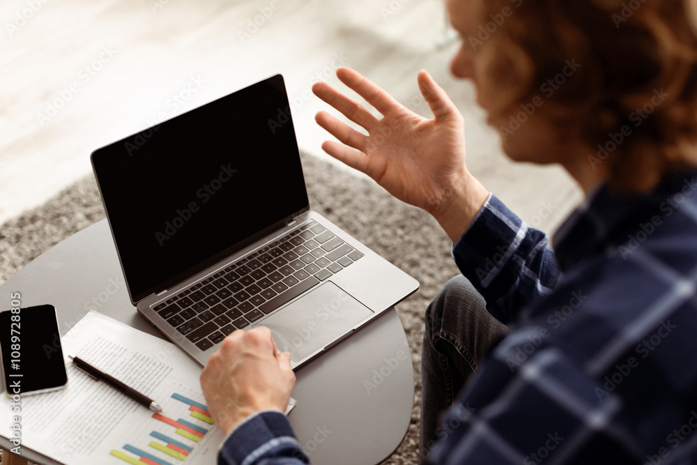 Poster distance communication. guy making video call on laptop with empty screen communicating online at ho