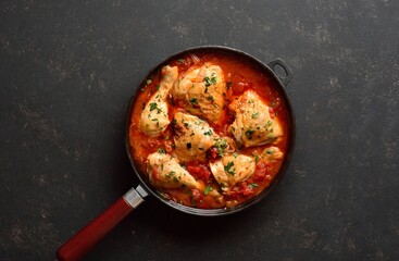 Georgian chicken stew with tomatoes and herbs