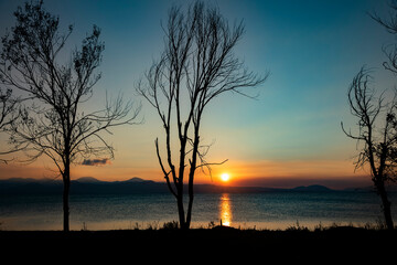 sunset orange and golden sea background