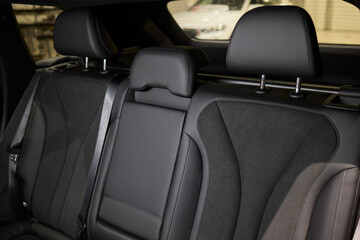Car back seat with headrest and arm rest, a comfortable automotive fixture