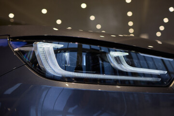 Close up of a cars headlight, part of automotive design