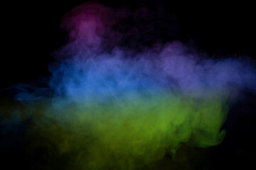 Yellow and green steam on a black background.