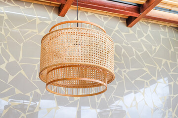Wicker lampshade in outdoor restaurant,Pendant light with Rattan lamps in street cafe,decorating...