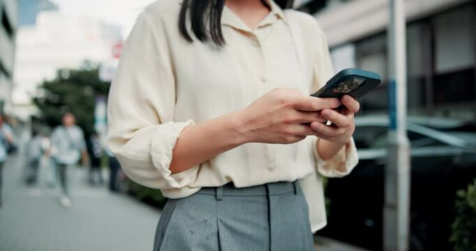 Japanese, person and hands with smartphone in city, walking and scroll with application for direction. Urban, female tourist and woman with mobile for online map, typing location and travel in Tokyo