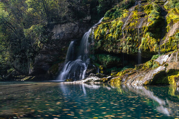 The incredible waterfall Virje in the wild nature and beauty of the famous Triglav National Park in...