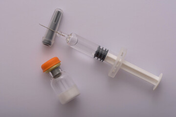 Jar with glucagon in high resolution on a white background. Diabetic coma. Hypoglycemia.