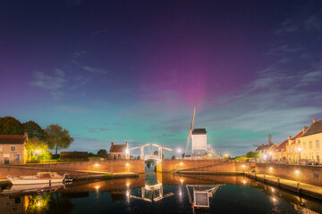 Northern Lights Over Heusden, Netherlands: Dutch Windmill and Reflections Under a Colourful Night...
