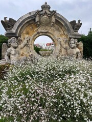 Angelic Fountain and Flowers Surrounding It