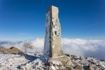 Maly Krivan, Mala Fatra, Slovakia. Stone obelisk and landmark on the top, peak and summit of the...