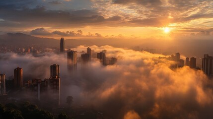 Brown panoramic Medell&Atilde;&shy;n skyline with misty buildings, sunrise, clouds, and mountains