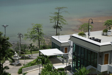 houses on the beach on the background of the sea