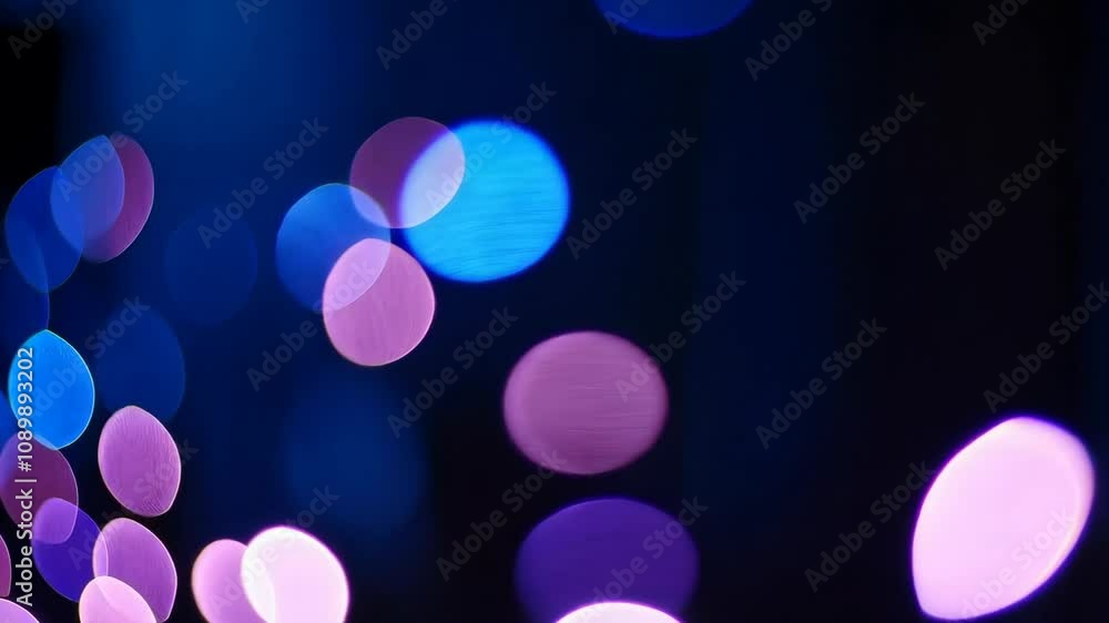 Poster softly glowing orbs in various colors and sizes drift serenely against a deep blue backdrop, invitin