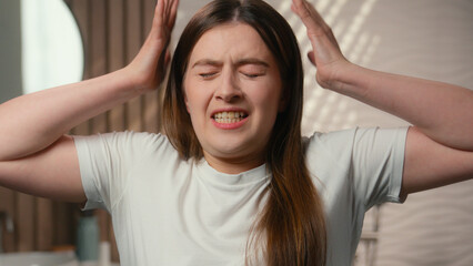 Caucasian woman girl female angry mad crazy scream at home bathroom problem crisis stress shout...