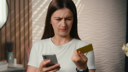 Stressed Caucasian woman lady confused girl anxious displeased female customer shopping online in...