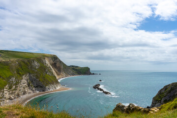 Beautiful double cove or bay on the Dorest coast. English coastline in summer