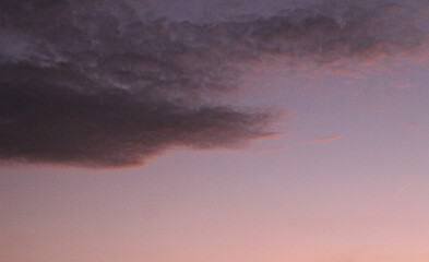 Fototapeta premium Beautiful evening sky at sunset with flaming bright light clouds.Bright sunset.