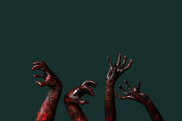 Many hands of zombies on green background. Halloween celebration
