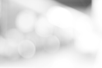 Blur white abstract background, blurred grey gradient bright light with copy space backdrop, banner, blank mordern business office interior hallway building design background, monochrome