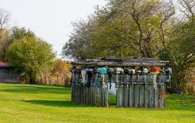 Boat motor engines hanging in shed