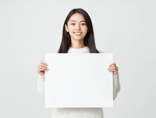 Fototapeta premium Striking Portrait of a Smiling Asian Woman in an Elegant Fashion Photoshoot