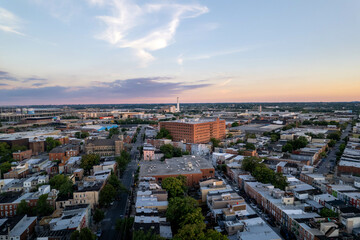 Naklejka premium Aerial Drone View of Baltimore City Skyline at Sunset